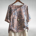 Women's Leaf Print Blouse – Round Neck Asymmetric Button Short Sleeve Curved Hem